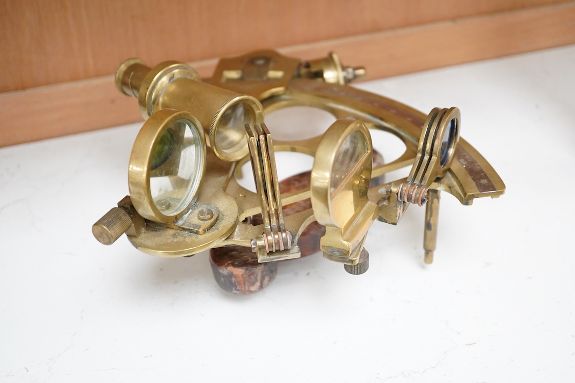 A late 19th century brass sextant by Ryland & Son Ltd. London, with later oak grip
